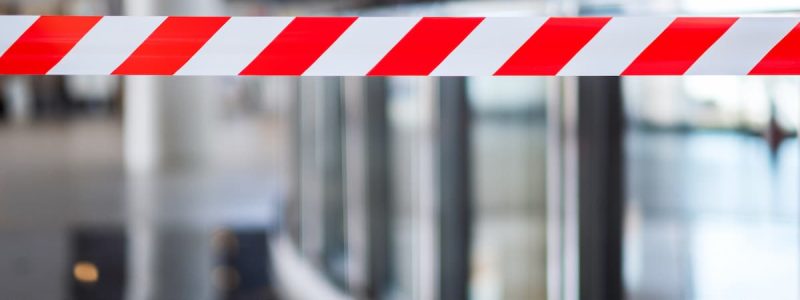 red-and-white-warning-tape-stretched-across-danger-2022-10-06-22-39-31-utc (1)